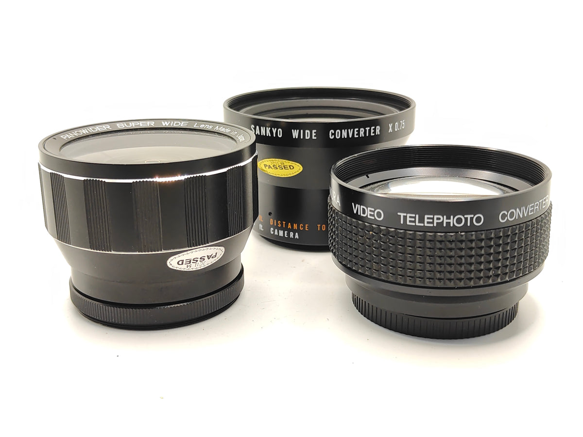 Screw-on Tele / Wide converter lenses for Super-8 cameras.