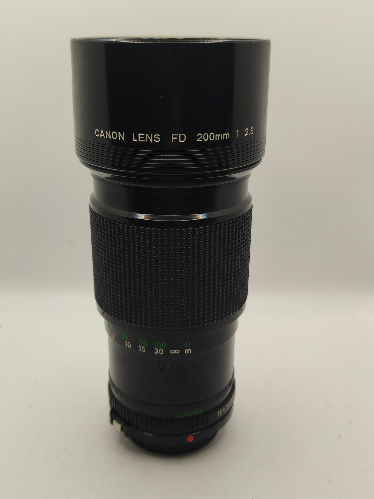 Canon New FD 200mm f/2.8 telephoto lens for AE-1, A-1, FTb SLRs.