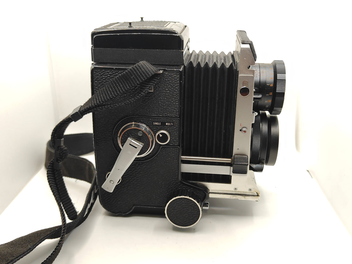 Mamiya C330 medium format camera + 105mm lens.