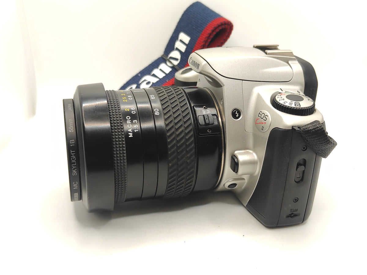 Canon EOS Kiss III camera with 28-80mm zoom lens