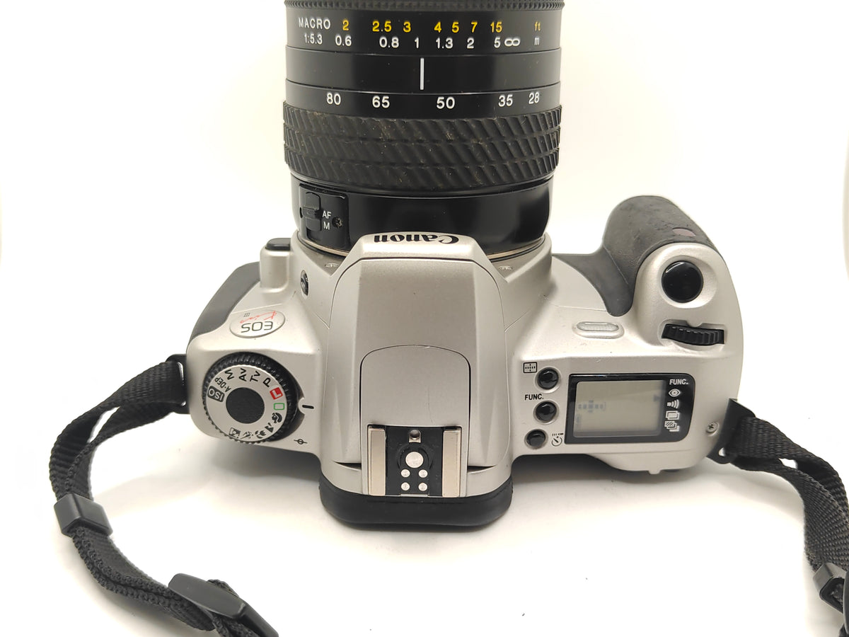 Canon EOS Kiss III camera with 28-80mm zoom lens