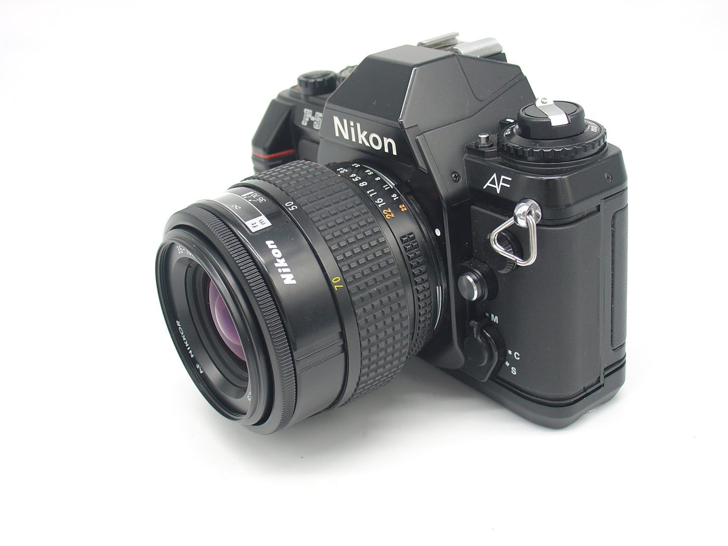 Nikon F-501 SLR film camera with zoom lens