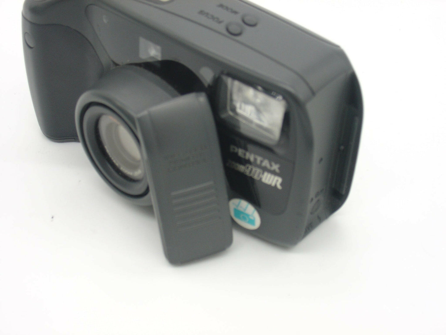 Pentax Zoom 90-WR point-and-shoot camera with remote control.