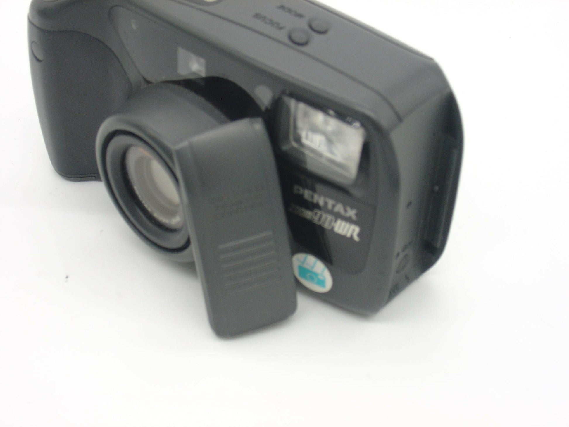 Pentax Zoom 90-WR point-and-shoot camera with remote control.