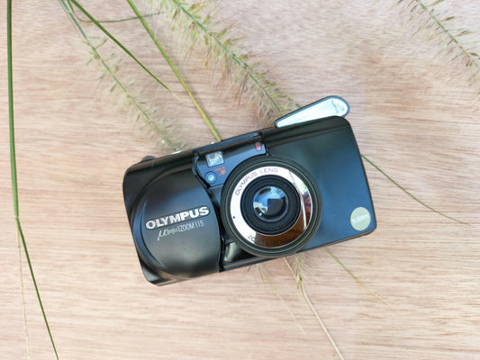 Olympus Mju Zoom 115 film camera in black.